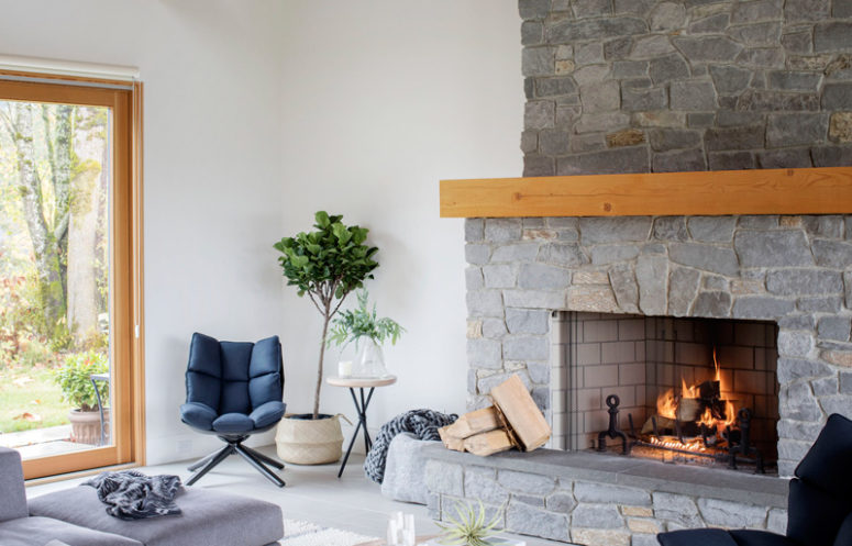 stone fireplace design The gorgeous stone clad fireplace is working, and it not only adds coziness but also reminds as that this is a rustic space