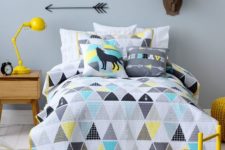 06 grey, turquoise, black and yellow pillows and a duvet for a modern feel