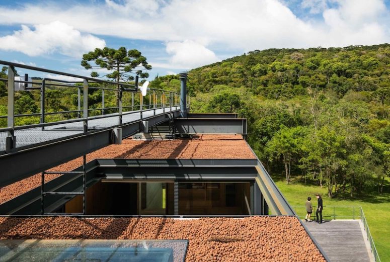 creative patio designs Patios and bridges connect the spaces and ensure a constant connection with the landscape
