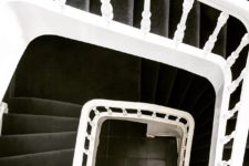 09 The staircase is black and white, truly minimalist, a restored piece of the 19th century