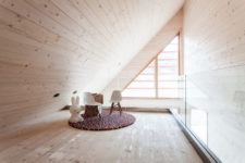 10 The attic ceiling definitely makes the space feel smaller but it also gives it a cozy feel