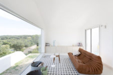 10 The brown leather sofa is placed to catch the valley views below and enjoy them