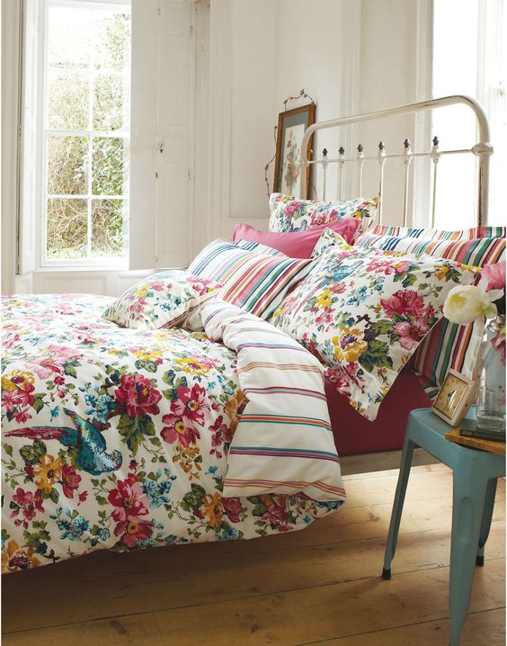 colorful bedding in different shades and with wildflower prints