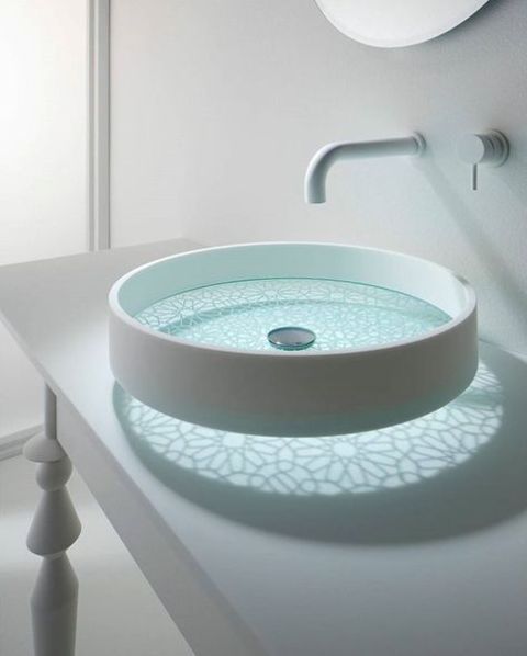 a beautiful glass sink with a pattern is a chic idea for a modern bathroom