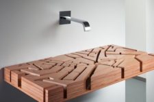 23 a wooden sink inspired by a map of London looks really unique