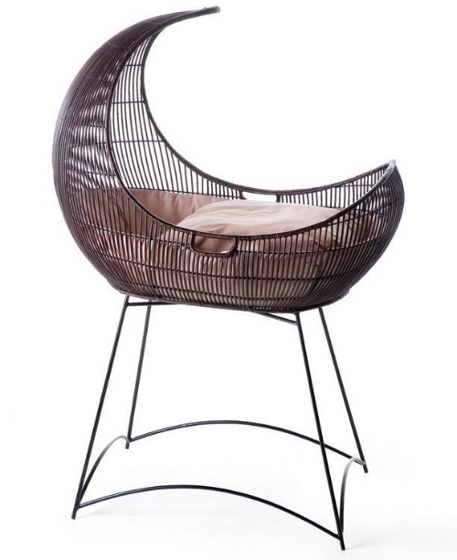 exotic moon-shaped cradle by Kenneth Cobonpue (via www.furniturefashion.com)