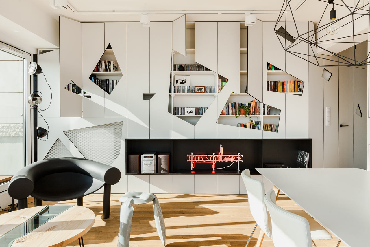 This modern penthouse features many cool designer solutions, and asymmetric wall panels are among them
