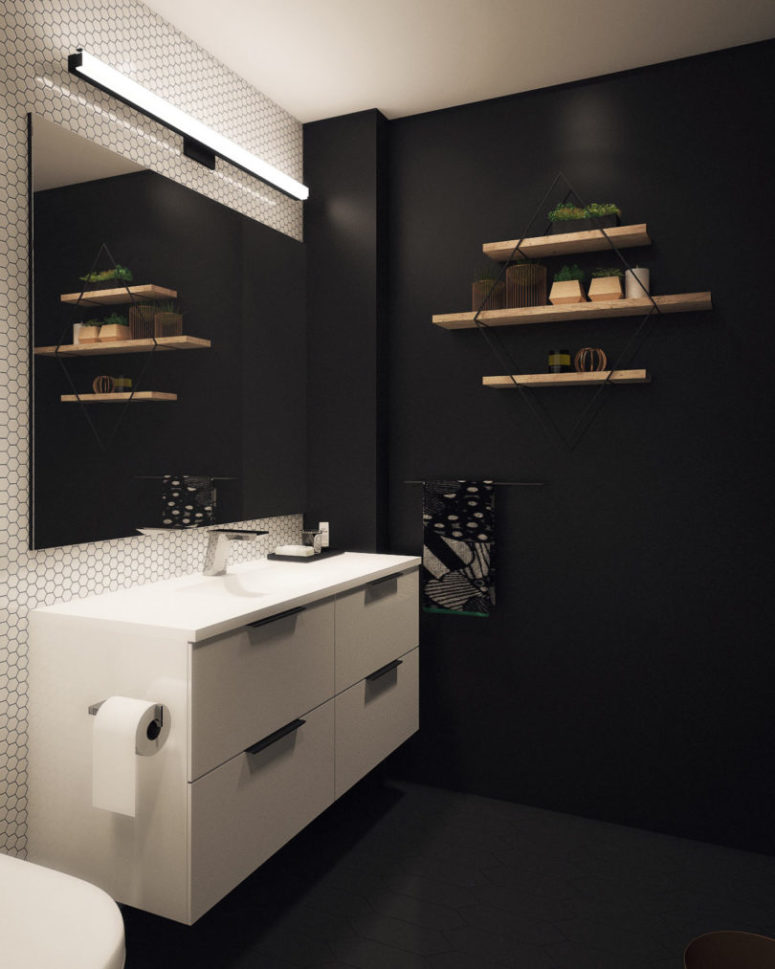 ikea bathroom furniture The vanity is from IKEA, there's a wooden shelf on the statement black wall, there are some living plants on the shelf