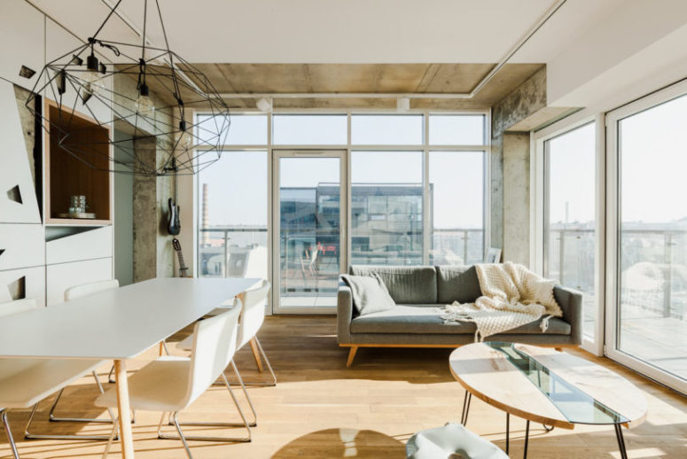 apartment with a balcony The sofa nook gets the views and light from all around, and there are two doors to reach the balcony