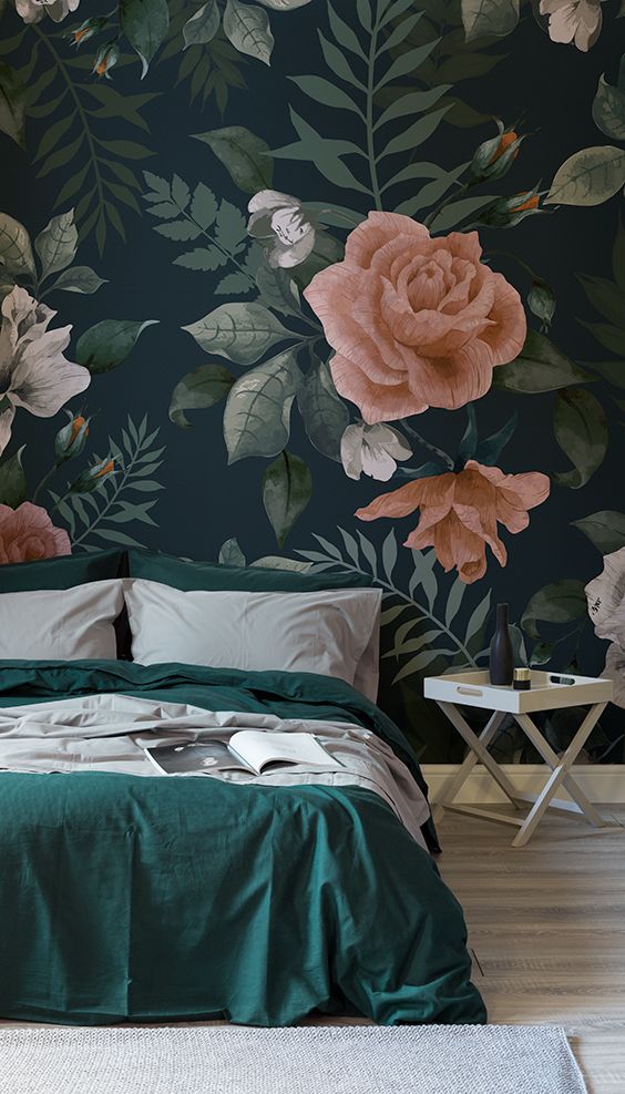 moody floral wallpaper that highlights the headboard wall in the bedroom