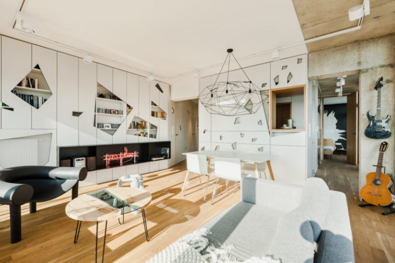 geometric interior design ideas Geometric details all over the space and modern and eye-catchy furniture make the penthouse chic and create its character