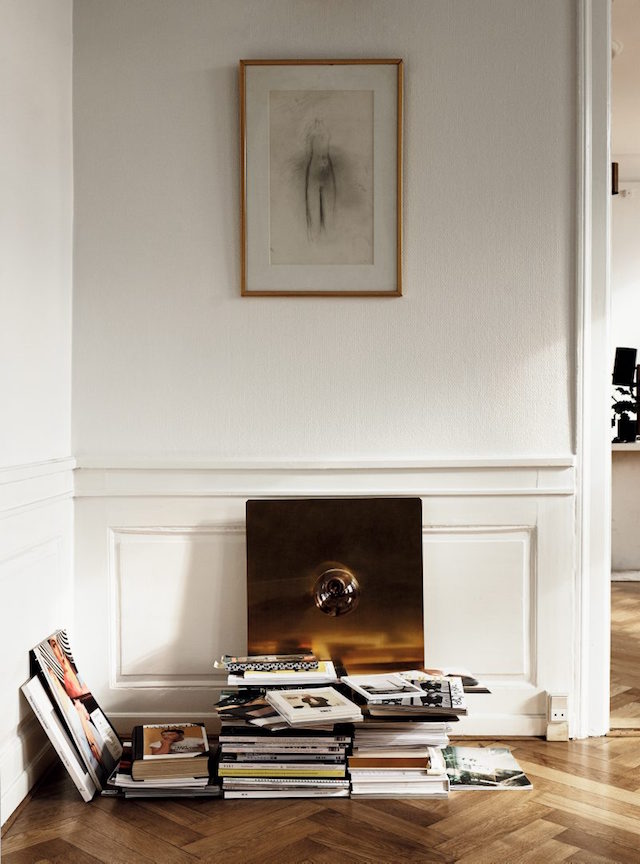 Stack your books somewhere in the corner and add a metallc detail , and they will easily become a part of the decor Stack your books somewhere in the corner and add a metallc detail , and they will easily become a part of the decor