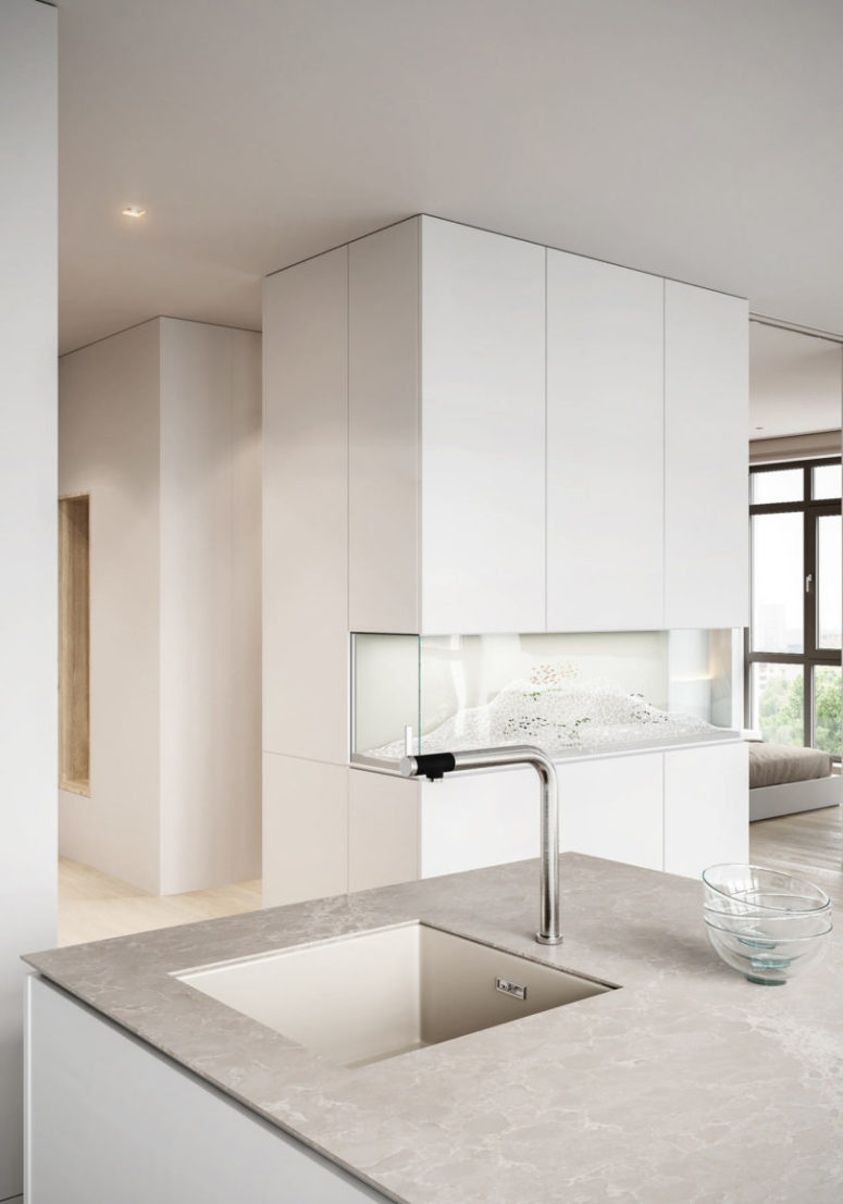 The storage units are organically incorporated into the interior here and there, there are no handles, so they look like usual walls or pillars The storage units are organically incorporated into the interior here and there, there are no handles, so they look like usual walls or pillars
