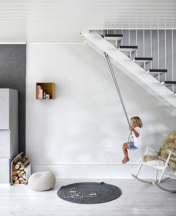 hang an indoor swing for your kids where there's enough space, for example, in an entryway