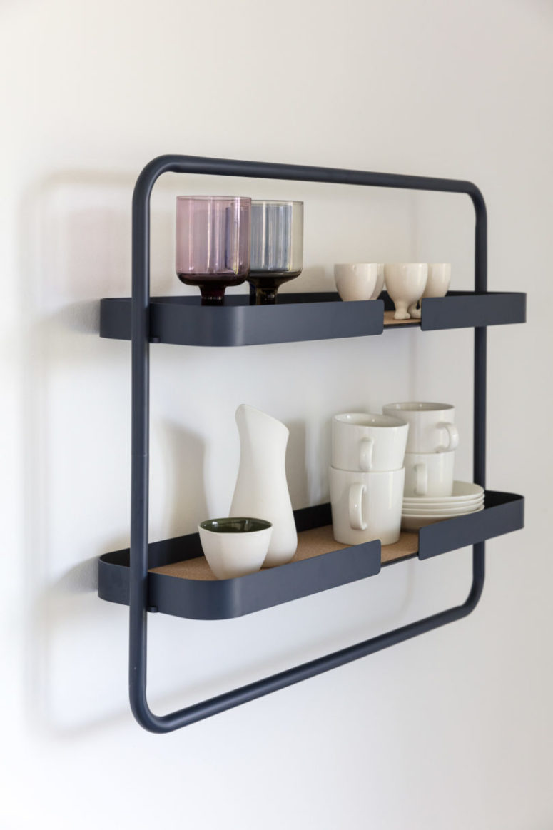 This framed two tier kitchen shelf is done in dark grey with cork, looks rather Scandinavian