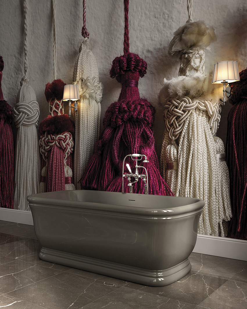 Unique 3D wallpaper showing giant tassels creates a bold look in the bathroom