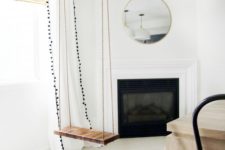 11 a simple stained wood swing can be a fireplace seat or just a comfy piece