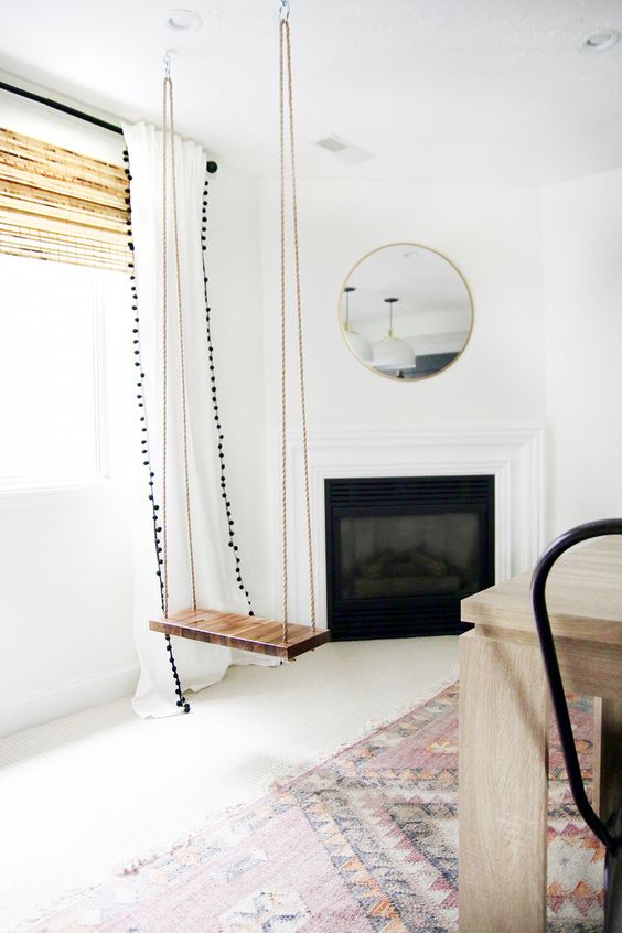 a simple stained wood swing can be a fireplace seat or just a comfy piece