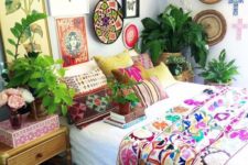 11 colorful printed pillow cases and a blanket in bold shades