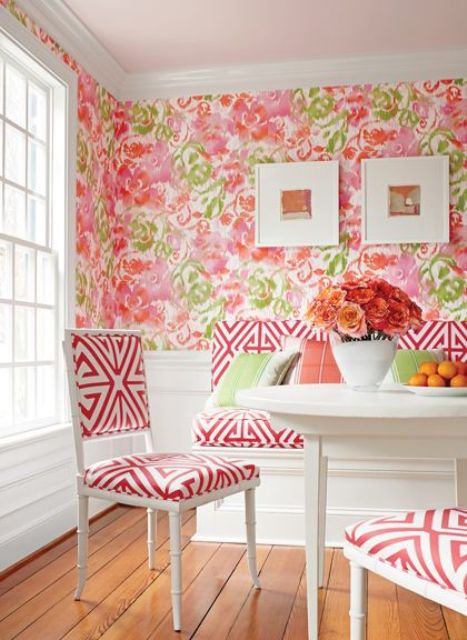 bold pink and green floral wallpaper to make the dining space more romantic