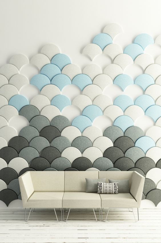 scallop acoustic penals in white, grey and blue create an interesting wall art
