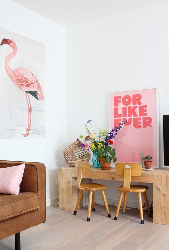 an oversized flamingo poster is easy to DIY and will easily add a tropical flavor
