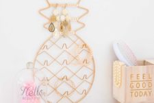 14 a wall pineapple jewelry holder is a cute idea for a girl’s room