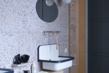 15 black and white dotted terrazzo and retro lamps and fixtures look unusual together