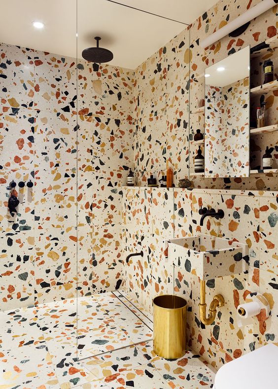 colorful terrazzo bathroom in blue, red and yellow is a bold and cheerful solution