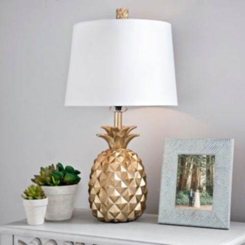 gold pineapple table lamp with a neutral lampshade will add glam