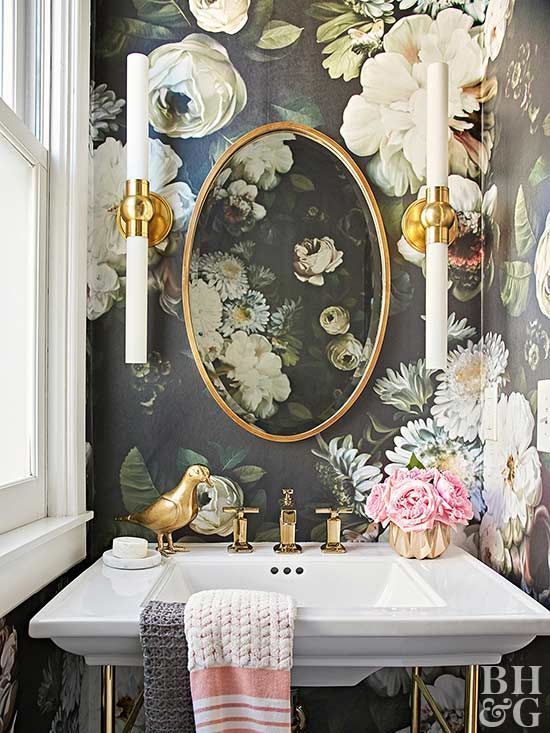 refined realistic floral wallpaper adds an exquisite feel to this powder room