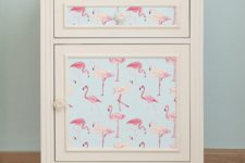 21 self adhesive, removable wallpaper with a pink flamingo print will change your nightstand