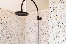22 terrazzo shower and walls covered with a different type of terrazzo