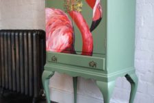 23 a vintage-inspired green chest of drawers with a bold flamingo
