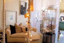 24 decorate your swing with banners and string lights to make it more inviting