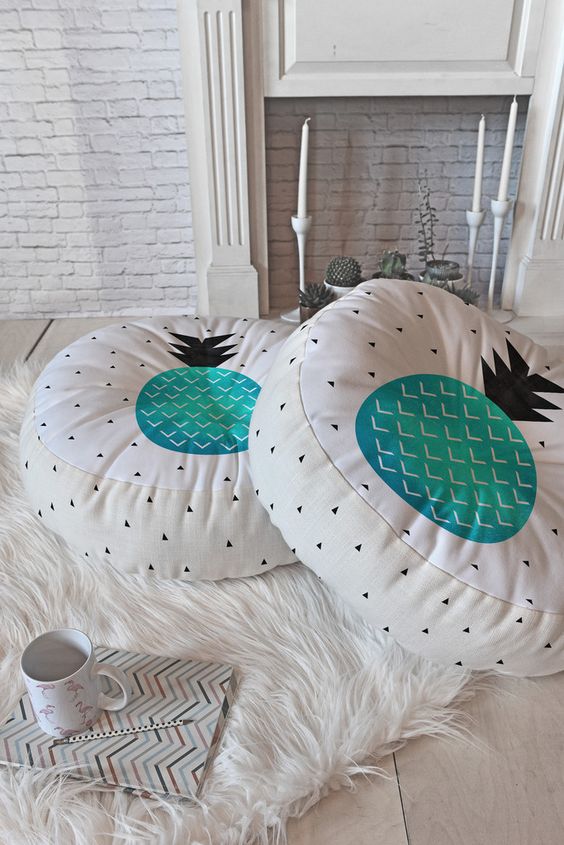 round white floor pillow with geo prints and turquoise pineapples