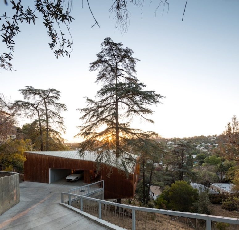 Unique Slope House Built Around Mature Trees