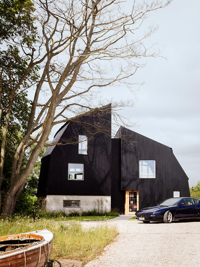 Houseboat Of Two Volumes And With A Wide Use Of Timber