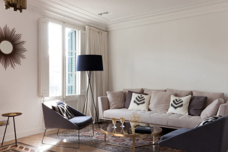 The color palette is soft and comfy with the shades of grey, beige, blush and some brass touches to give a glam feel to the space