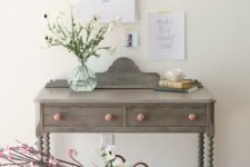 03 a vintage grey painted desk with pink knobs used as a console for a shabby chic interior