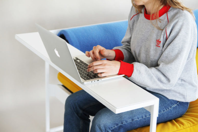 The armrests can be also used as desks, which makes the piece super functional and ideal for urban living