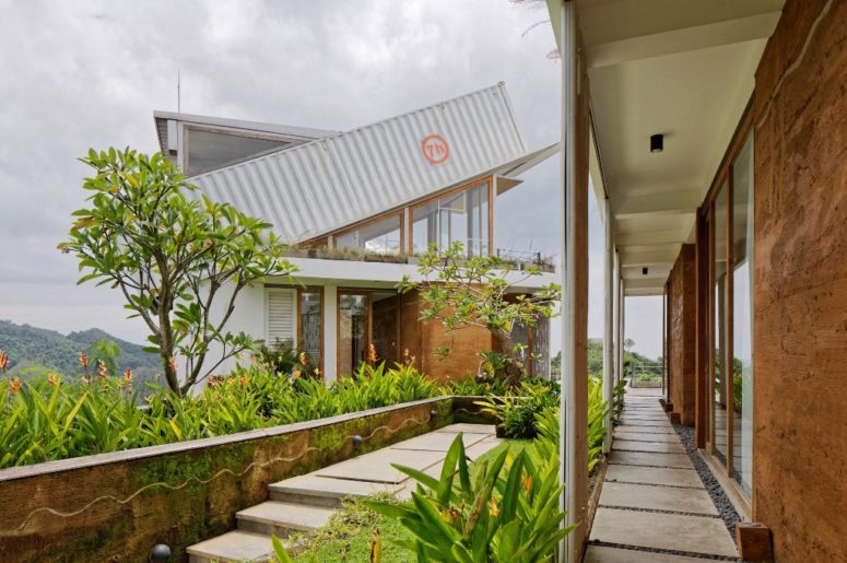 There's much greenery and flowers outside as the house is located in one of the islands east of Bali