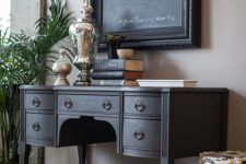 04 a black desk turned into a console wil easily fit a rustic or vintage-inspired interior