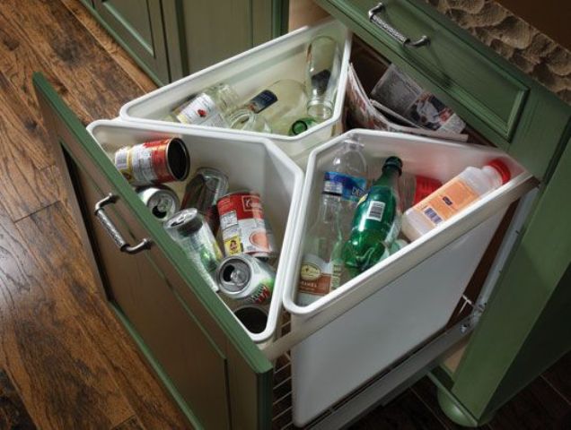a pull out drawer with separate trash cans is a comfortable idea