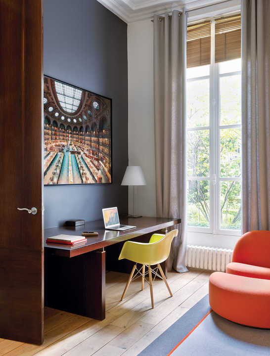 mid century office design The home office has a mid-century modern feel and colorful upholstered furniture, there's an inspiring artwork in front of the desk