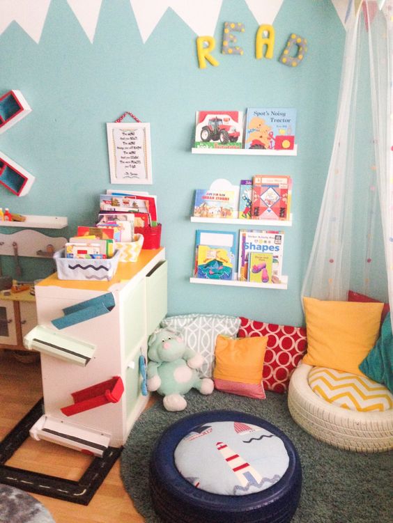 a reading nook separated with a cabinet from the other zones