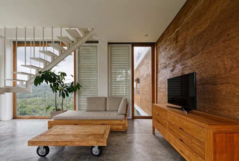 The inner decor on the whole is a unique mix of minimalism and industrial style, there's much wood including bamboo, which is a local material