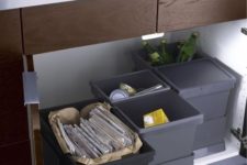 09 pull out separate trash cans under the sink look neat and help sorting out the trash