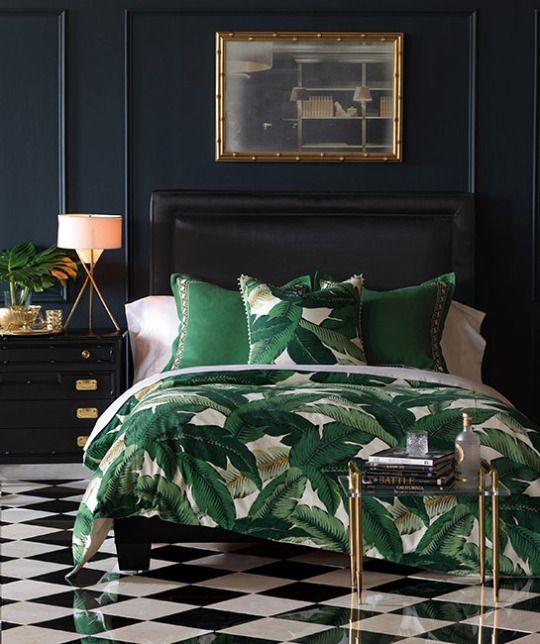 tropical leaf print bedding is a budget-friendly way to spruce up the bedroom