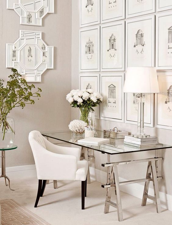 vintage-inspired office with a trestle leg desk and a glass tabletop for an elegant and chic look